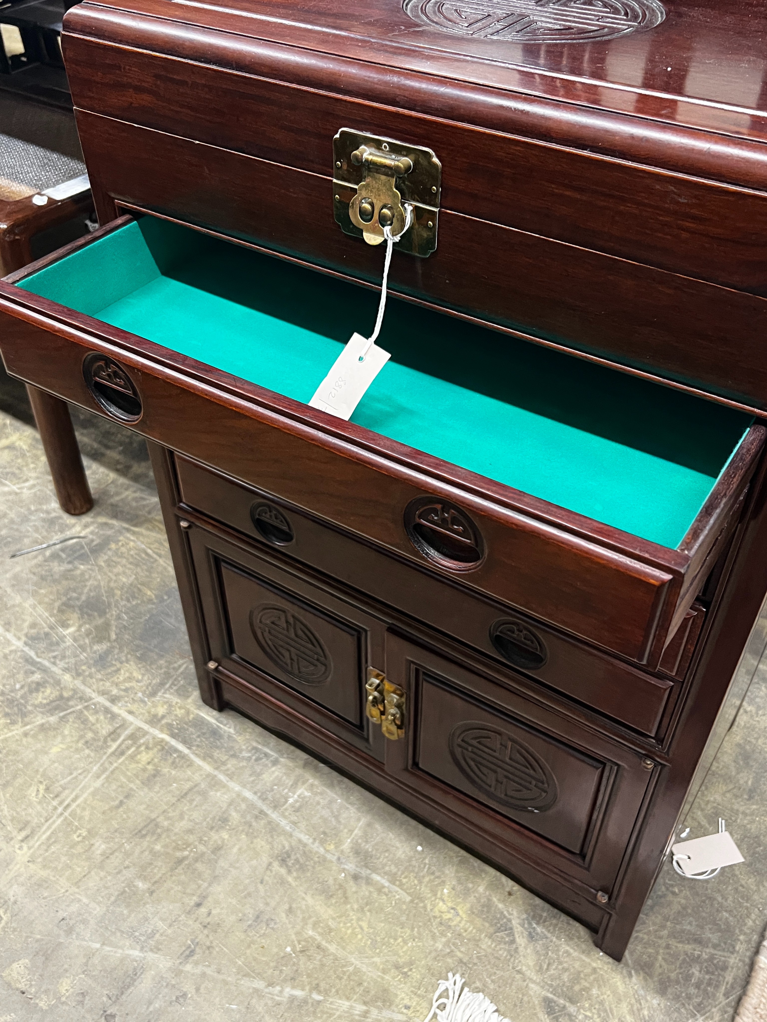 A Chinese carved hardwood canteen cabinet, width 56cm, depth 35cm, height 49cm